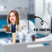 Cardboard cutout of a doctor on a stick with a 10-inch measurement label against a blurred medical background.